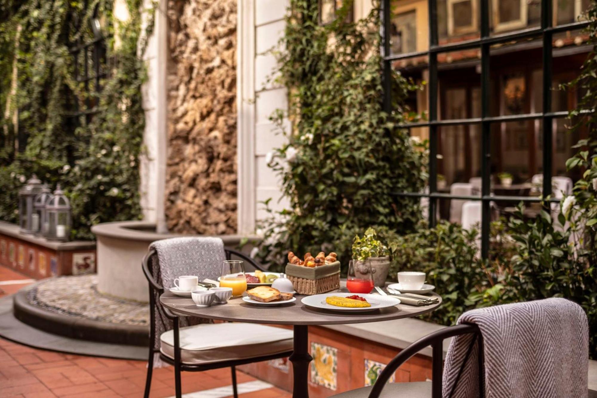 Tivoli Palazzo Gaddi Firenze Hotel Exterior foto The hotel's courtyard